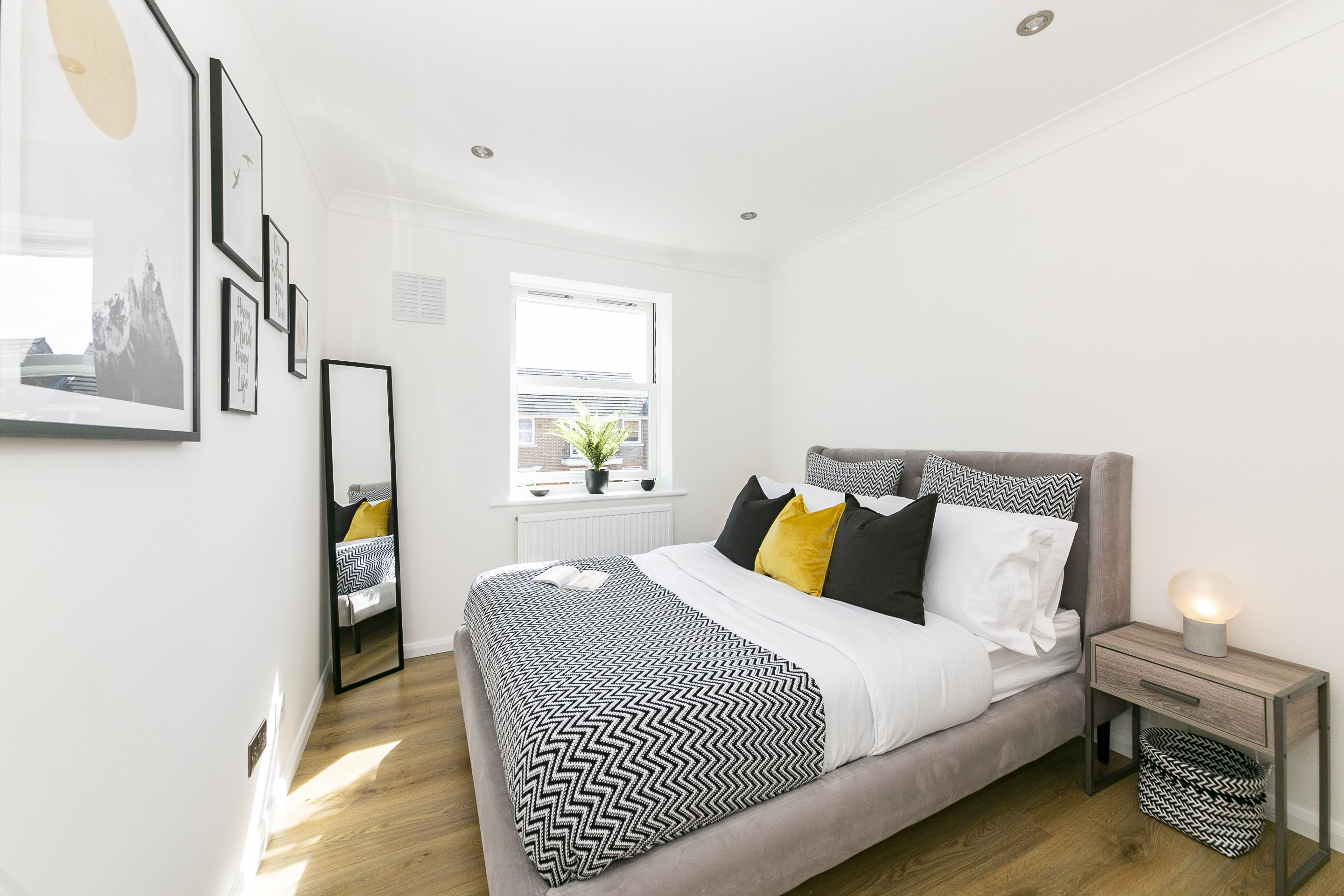Bedroom photographed for a London residential property listing with neutral styling