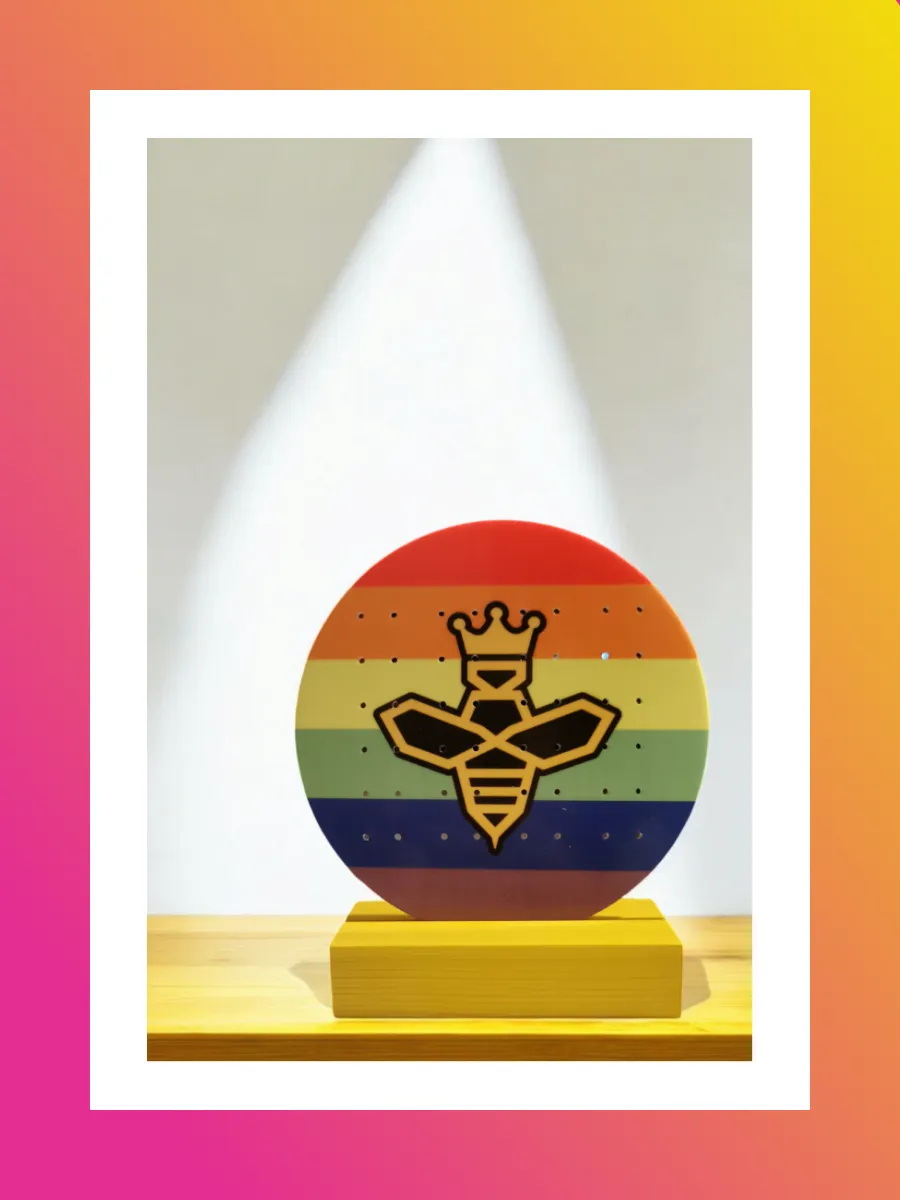 Branded Earring Holder with a yellow and black bee on for IATQB