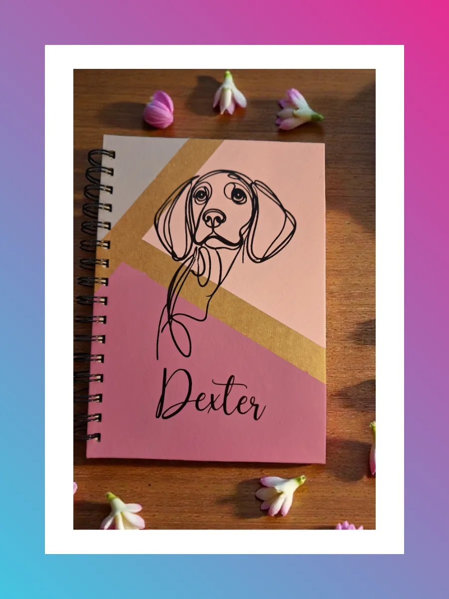 A branded kraft notebook on a brown background