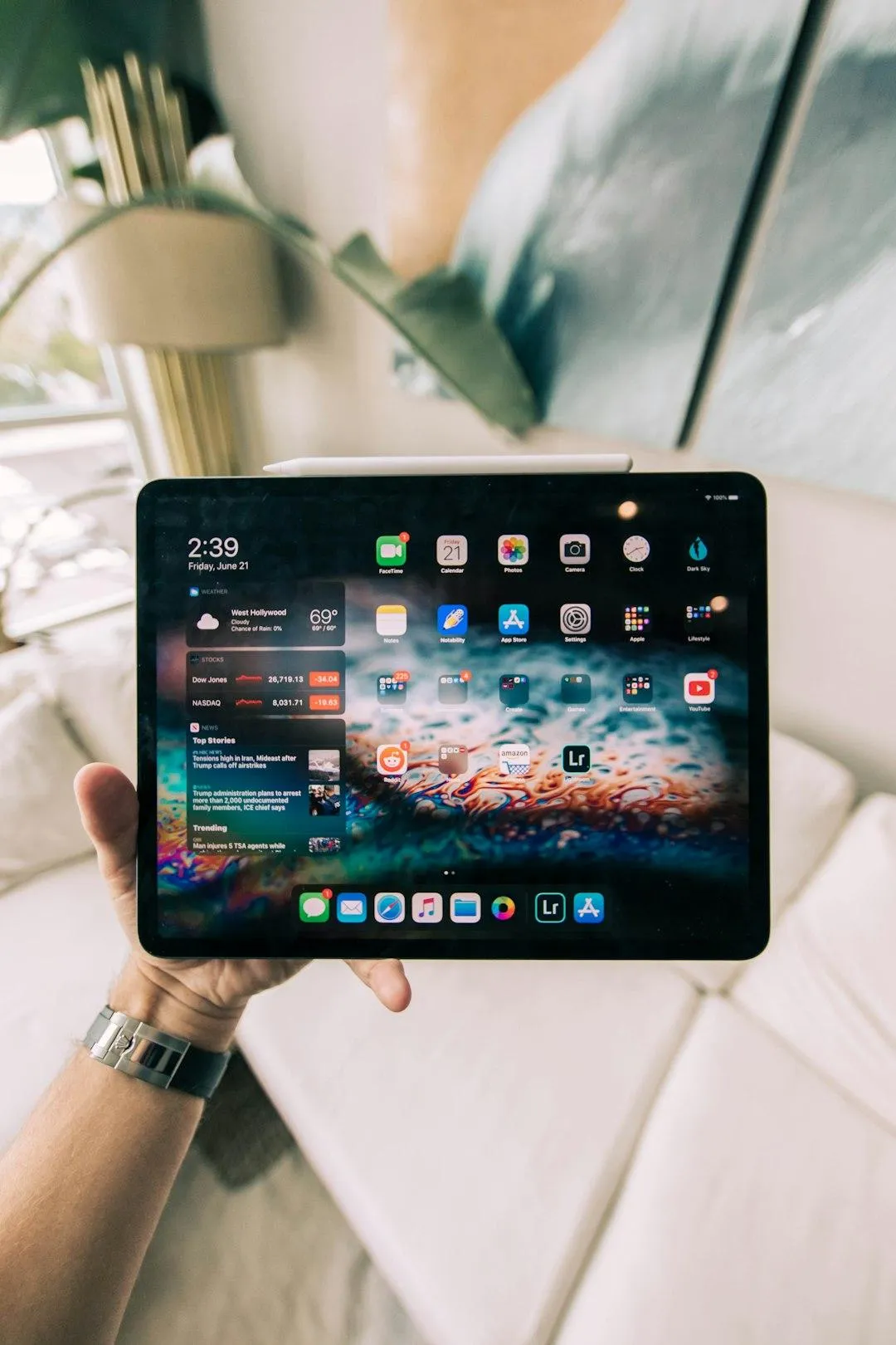 Pic of tablet in the hand of person