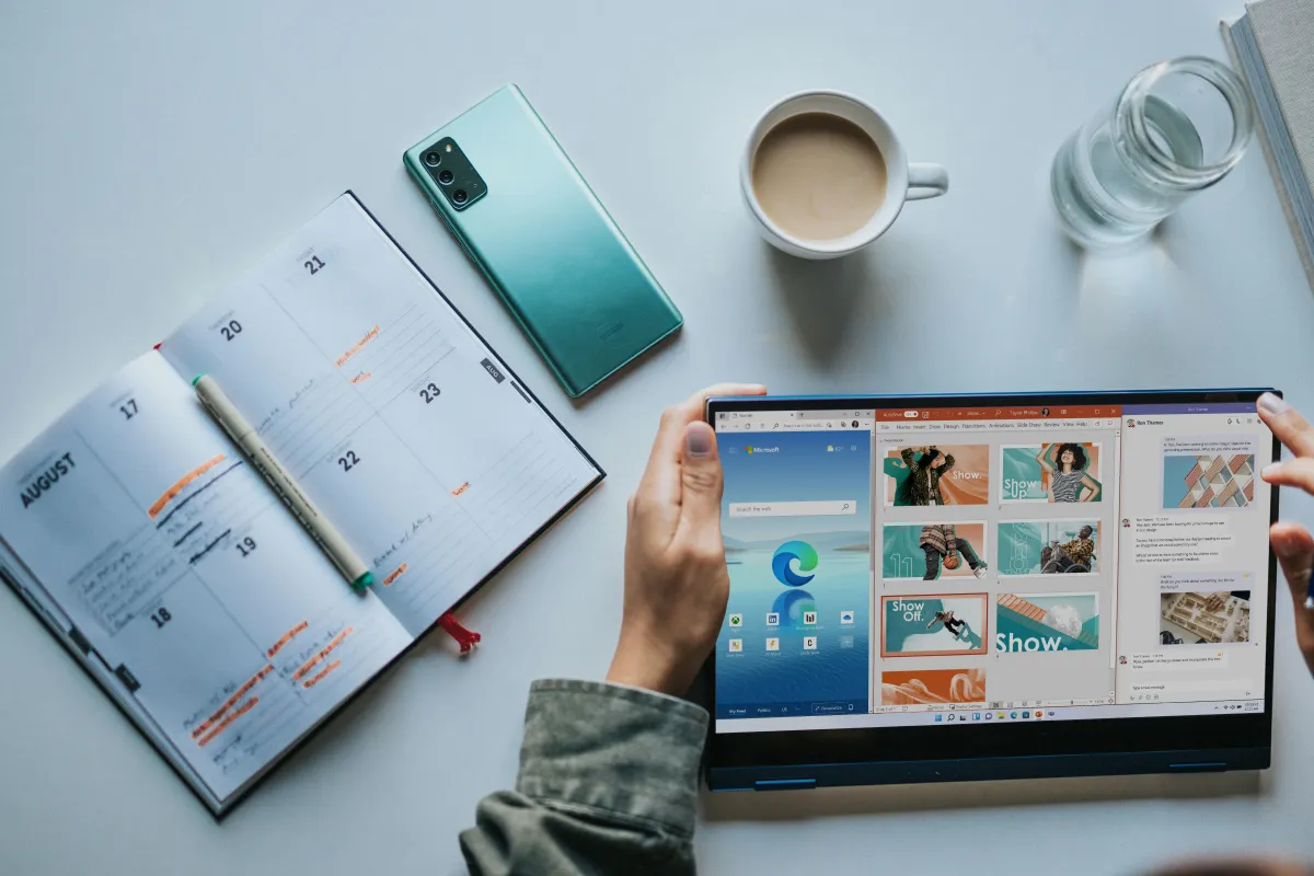Computer with white mug