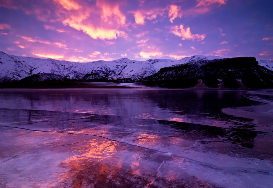 frozen lake in purple twilight symbolizing stillness, self-reflection, and the emotional impact of chronic pain on identity