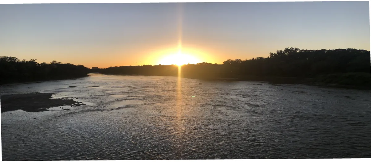 sunrise over calm lake symbolizing healing, renewal, and reclaiming life after chronic pain