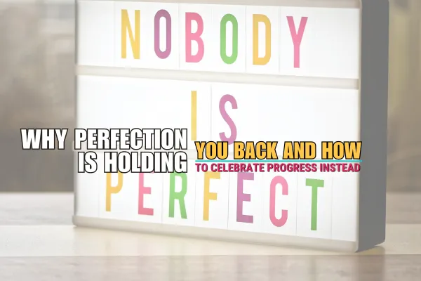 An encouraging image of a lightbox displaying the message “Nobody Is Perfect” to inspire embracing progress over perfection.
