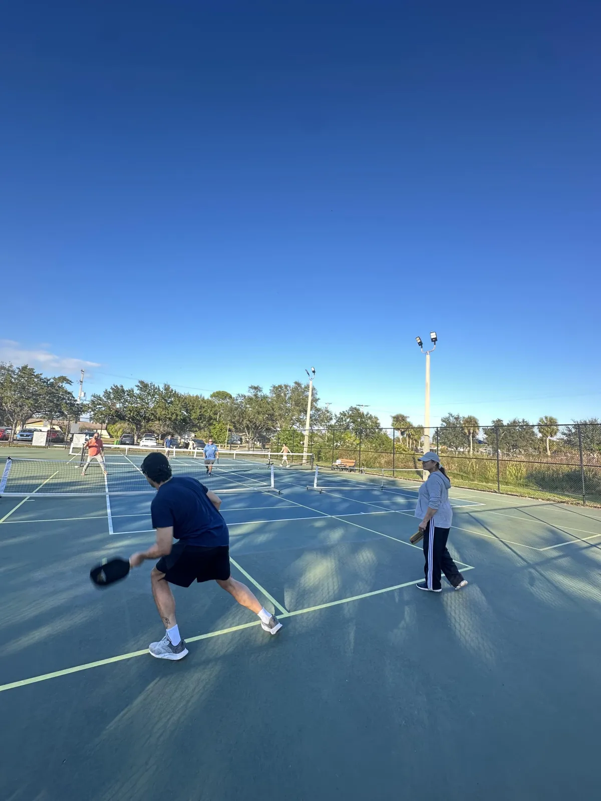 People engaging in aerobic, strength, and balance exercises to improve metabolic health and longevity — Age-X Clinics