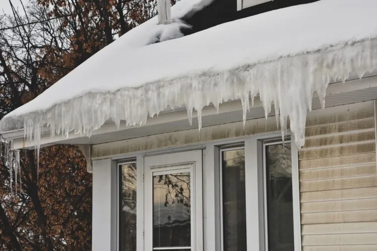 How Ice Dams Form and How to Protect Your Roof and Gutters