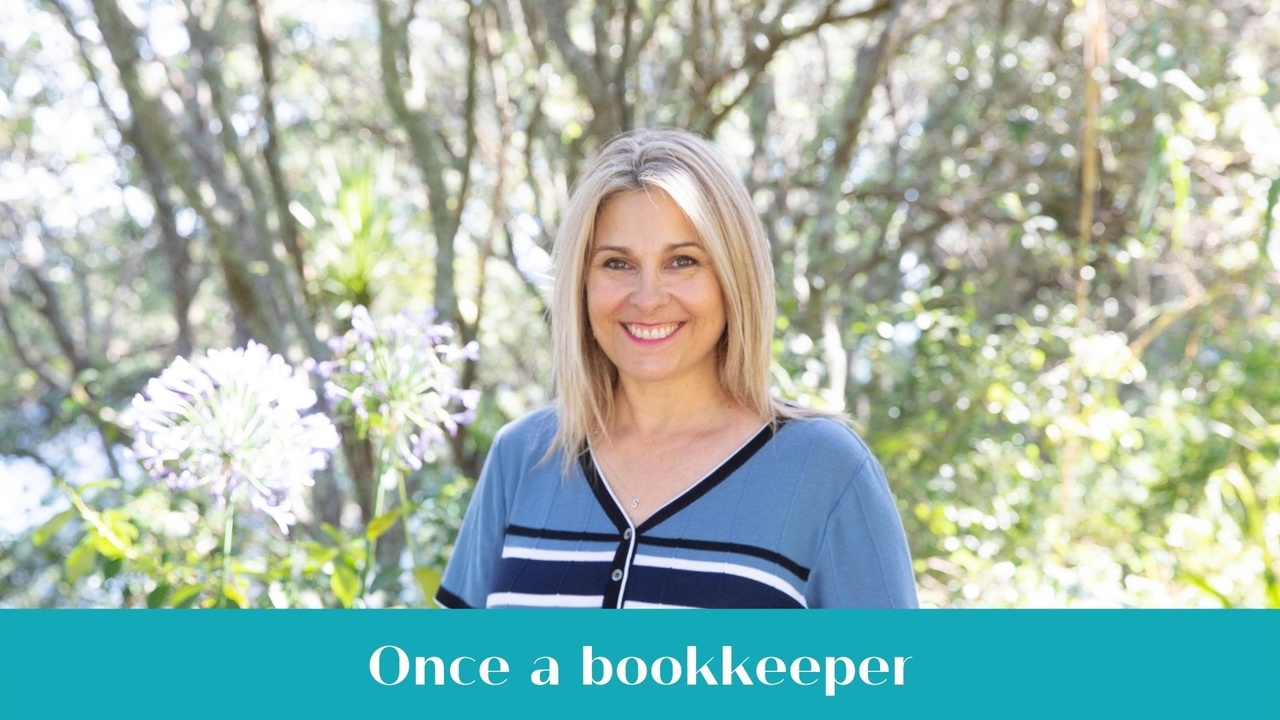 Experienced bookkeeper and business coach working on accounting software, reflecting ongoing involvement in the bookkeeping industry