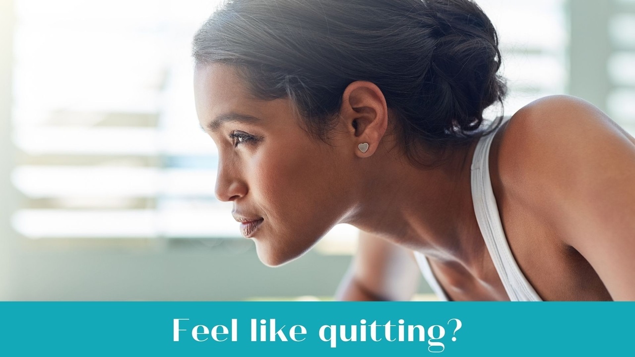 Overwhelmed bookkeeper taking a pause and reflecting on business challenges