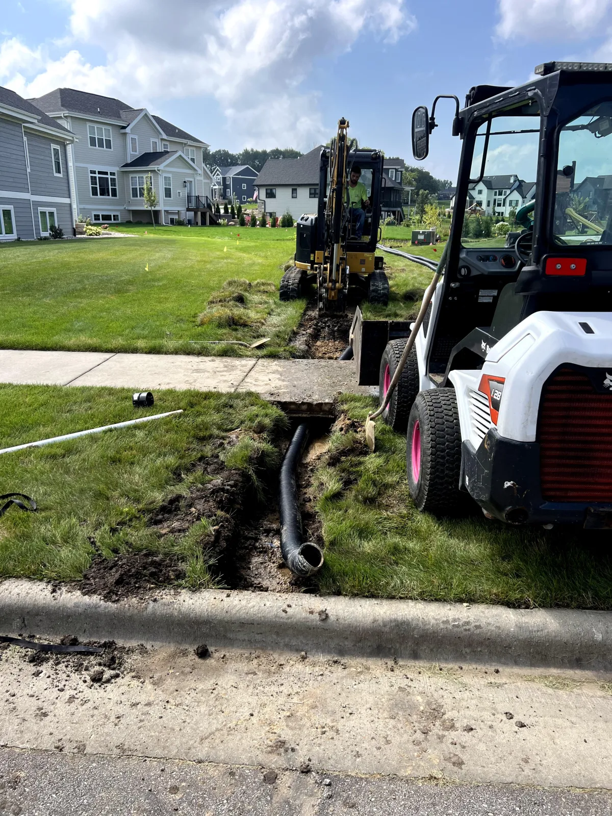 Neighbors flooded their yard, All Service to the rescue! We built a drain that can throw all the water you throw at it away from the property!