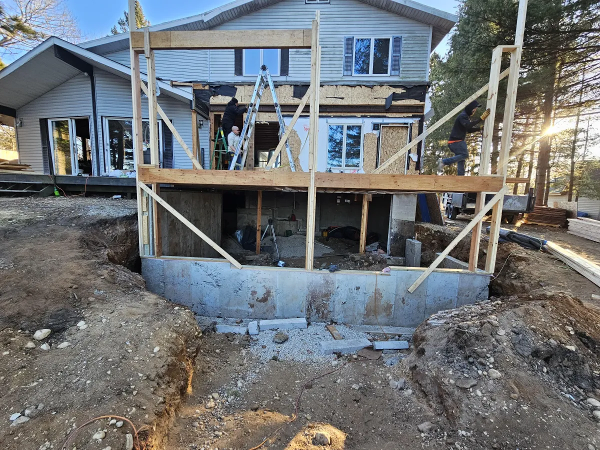 Rough Framing on top of the newly poured concrete walls. 