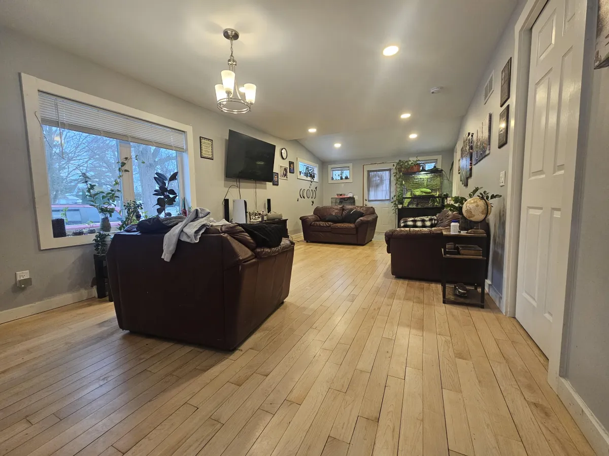 New flooring, windows, walls, ceiling, this was a complete rehab this is the after picture. Looks awesome!!