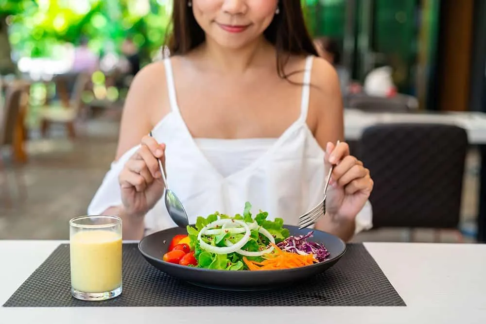 woman eating healthy food