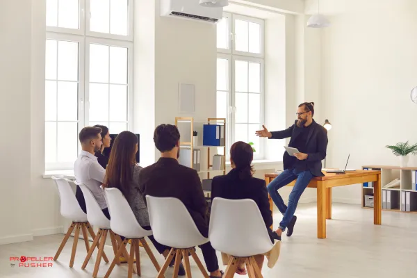 Professional leading a strategic conversation in a meeting with symbolic growth visuals in the background.