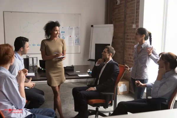 Female entrepreneur connecting with an audience during a coaching session.