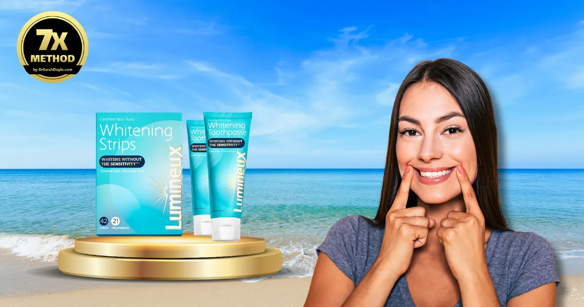A woman smiling brightly while holding and using Lumineux Whitening products, showcasing her radiant teeth and the product's effectiveness.