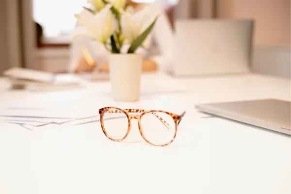 clarity clear glasses on a table