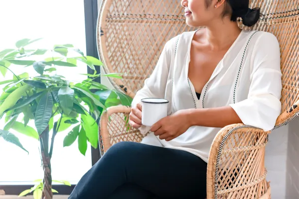 Woman in a a chair, a moment of clarity and focused reflection.
