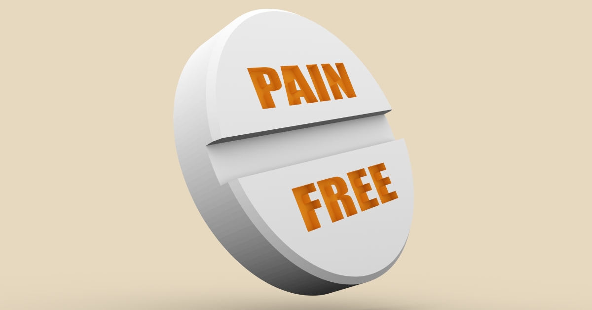 A white pill engraved with the words “PAIN FREE,” symbolizing relief from pain and the concept of recovery from pain medication dependence.