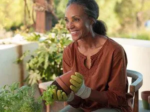 woman gardening on porch