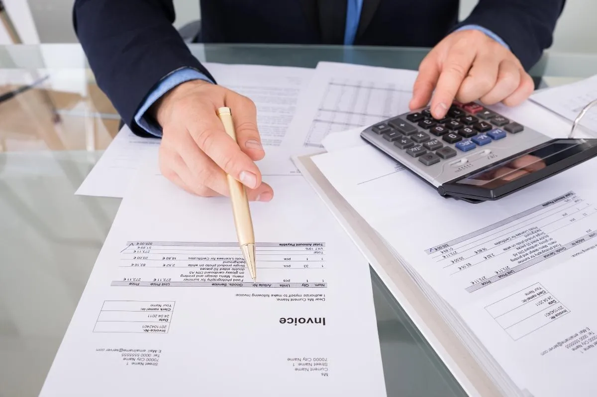 Image of a person working on accounting automation software