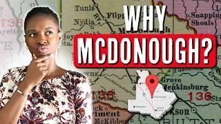 Why McDonough? - Real estate agent Falecia Terry pondering in front of a map of McDonough, GA