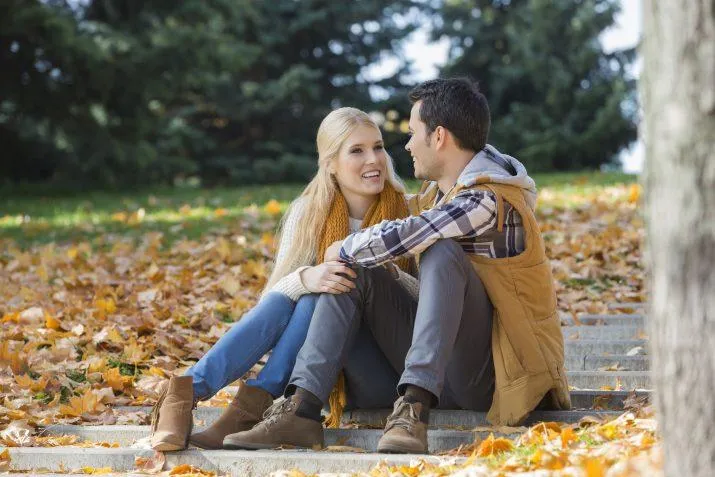 man and woman smiling at each other