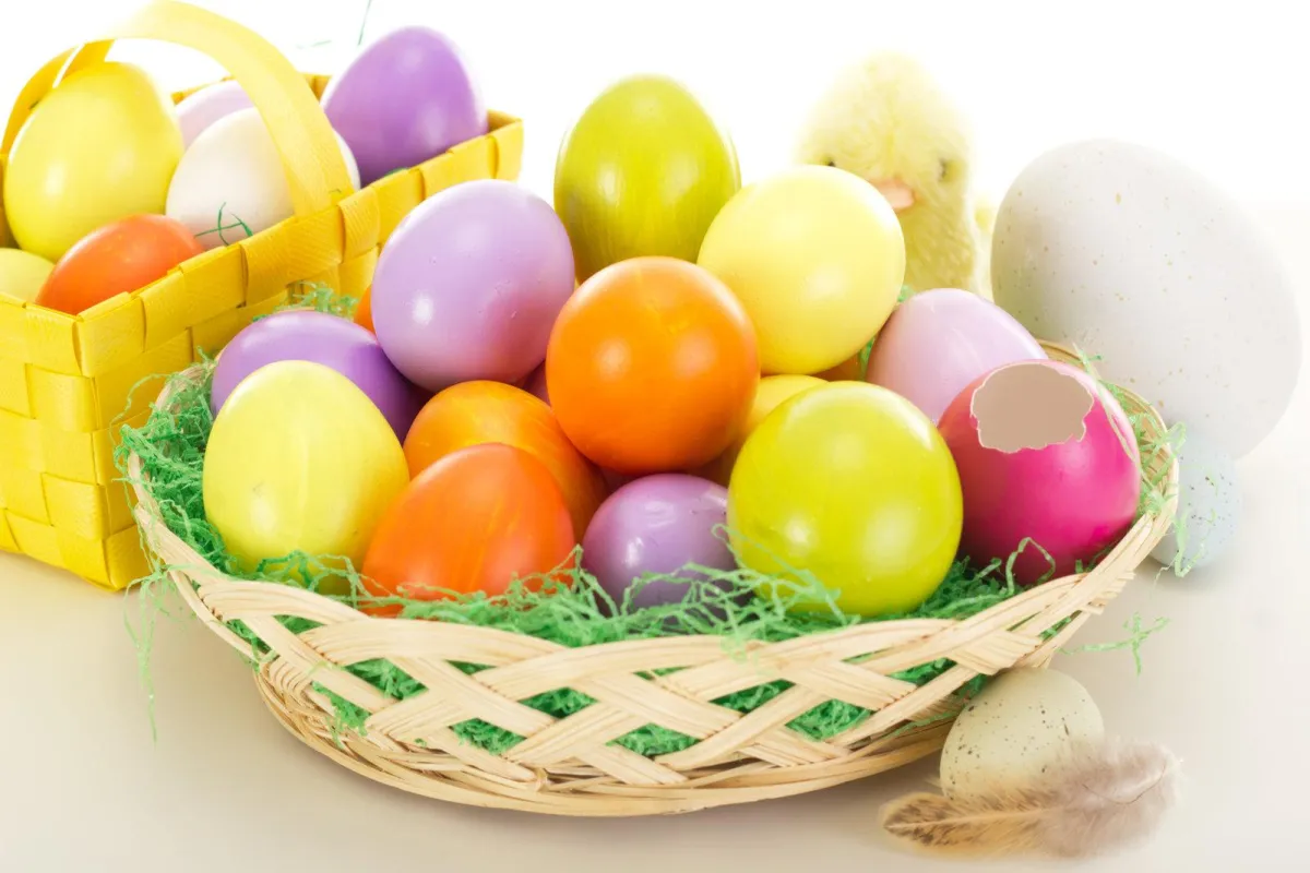 Easter basket full of colorful eggs