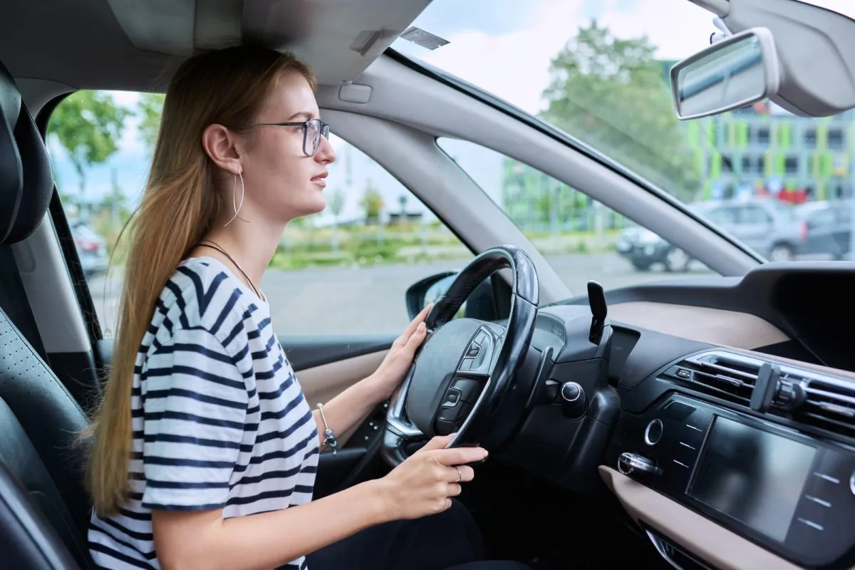 teen driver behind the wheel