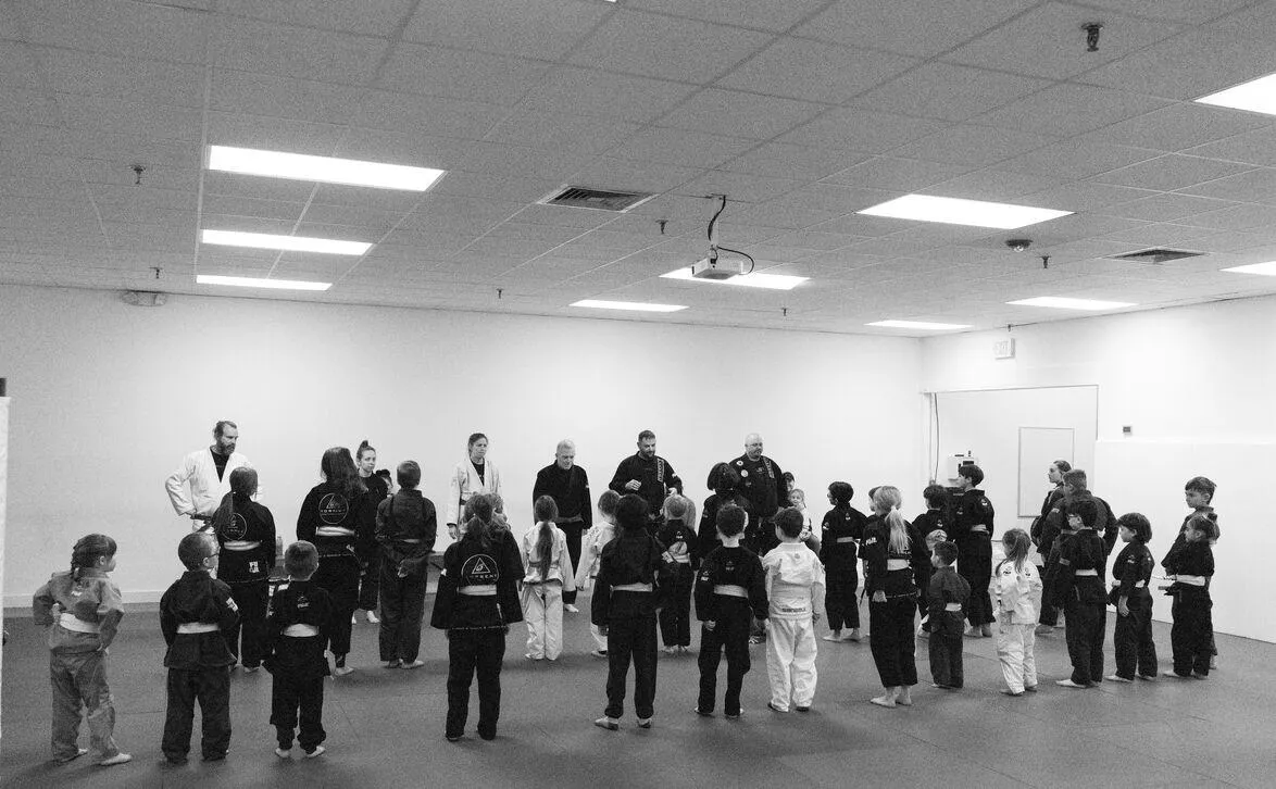 Students practicing Brazilian Jiu Jitsu at Torrent BJJ in Hanover, MA, learning the techniques rooted in the art’s history