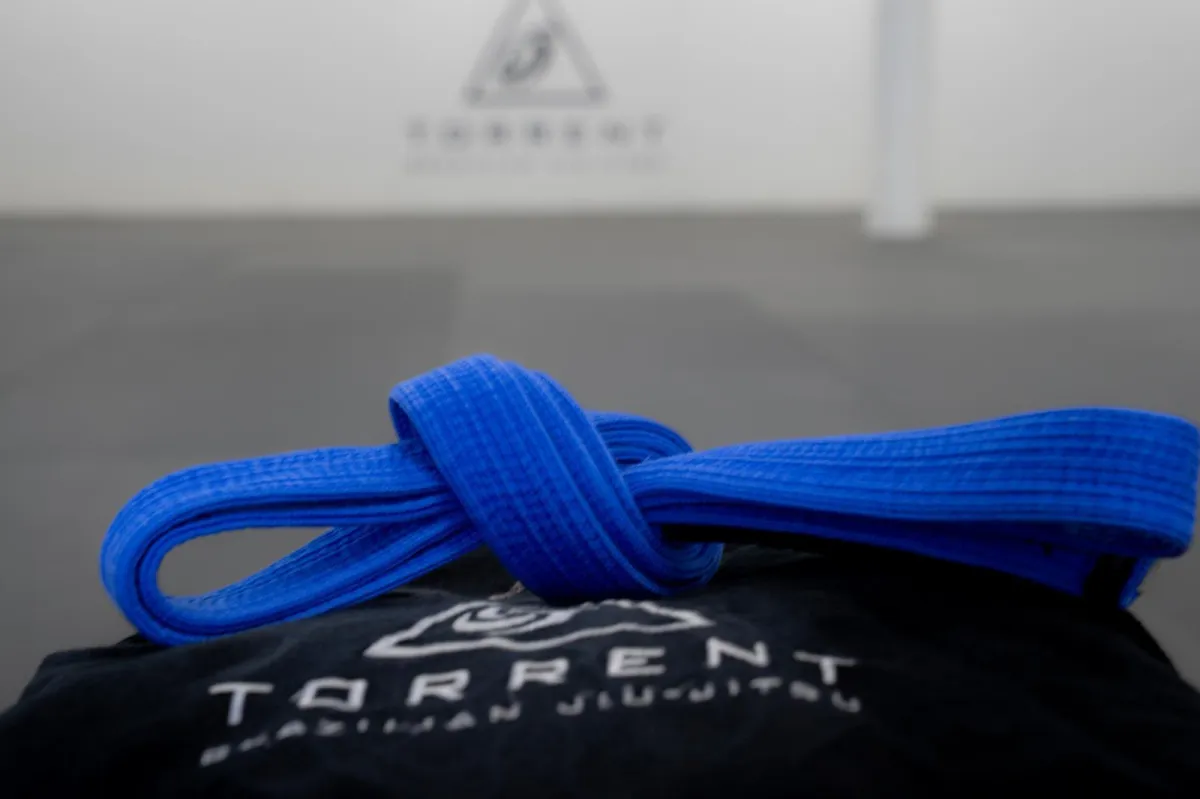 Close-up of a blue belt at Torrent BJJ in Hanover, MA — symbolizing progress and dedication.