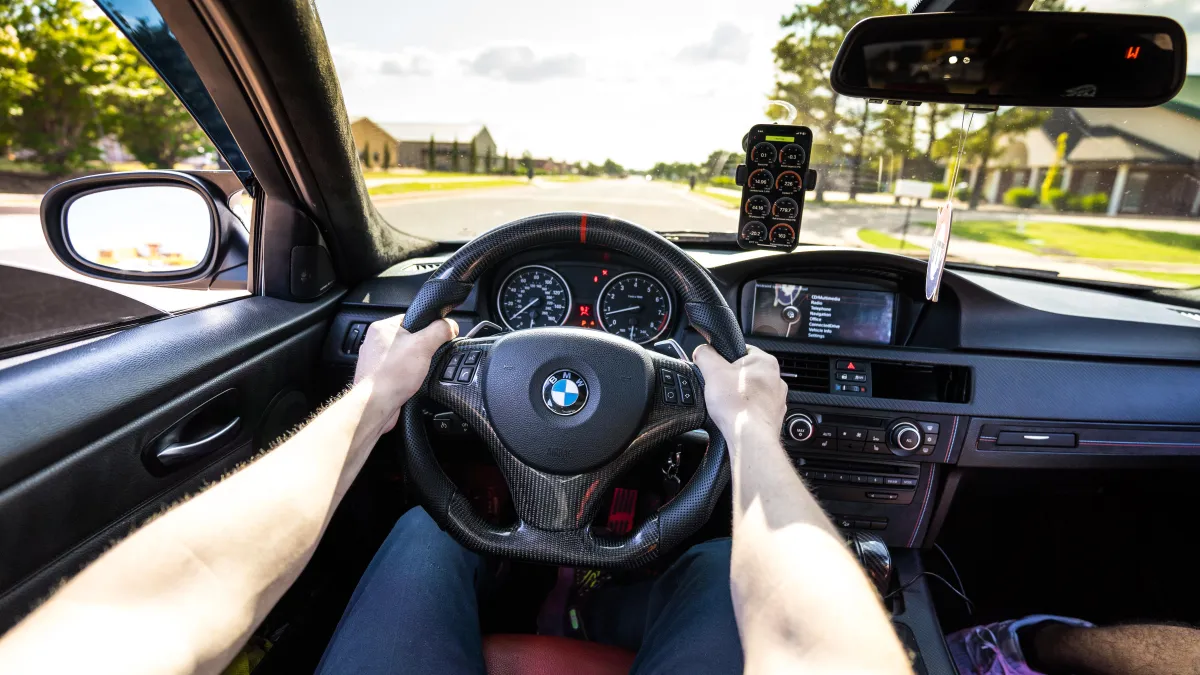 BMW performance car behind the wheel