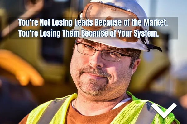 Frustrated construction worker in safety gear, representing missed sales opportunities in contracting businesses.