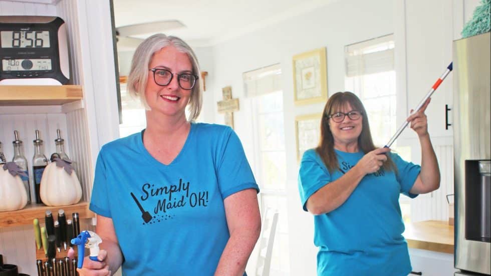 Simply Maid OK professional cleaners smiling after completing a home cleaning service in Oklahoma, representing trustworthy and high-quality maid services.