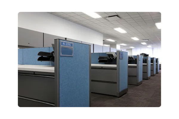 Office cubicle representing the daily work routine.