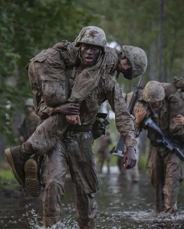 Soldier carrying another soldier