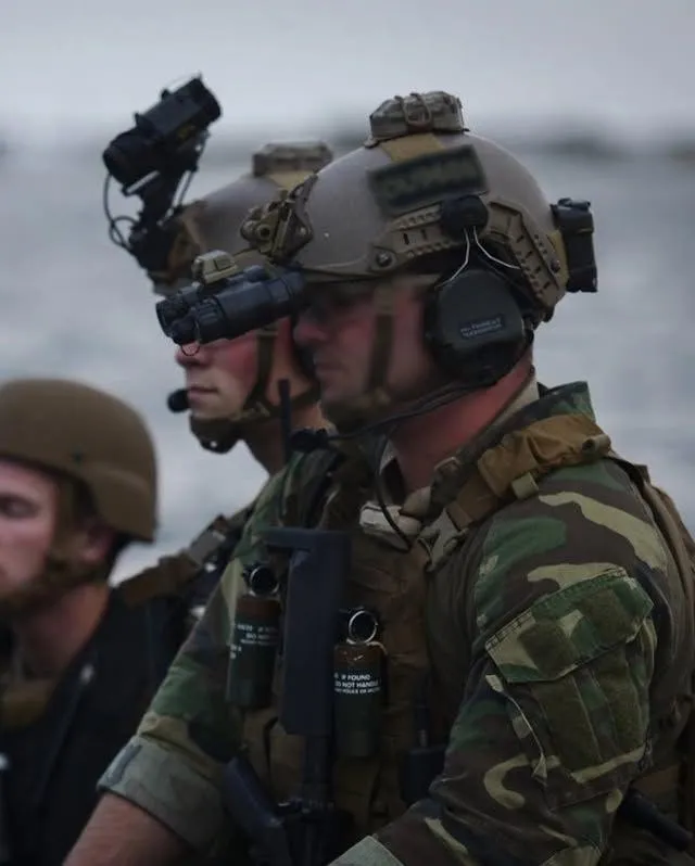 soldiers outside using equipment