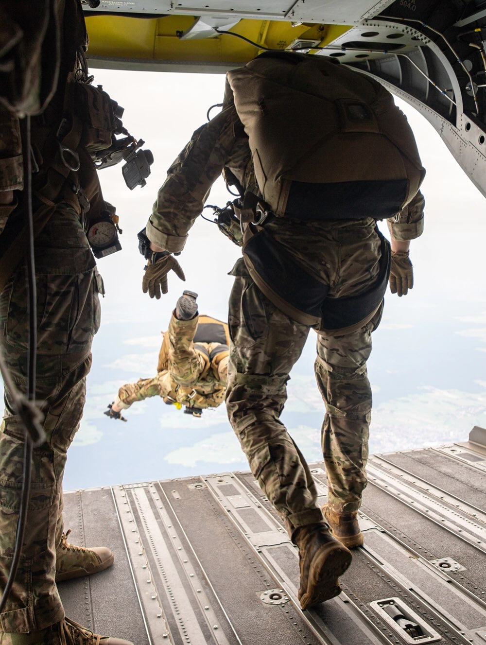 soldiers jumping out of plane