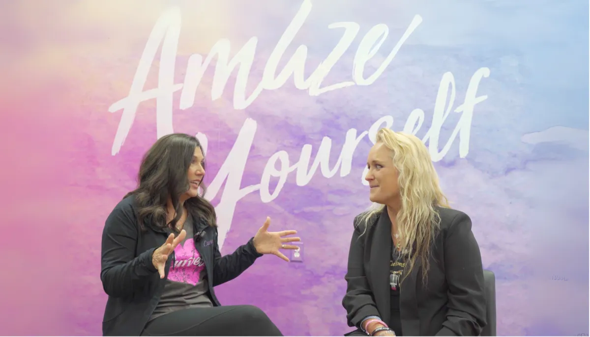 Kim McQueen and Kim Martin celebrating in Curves Club