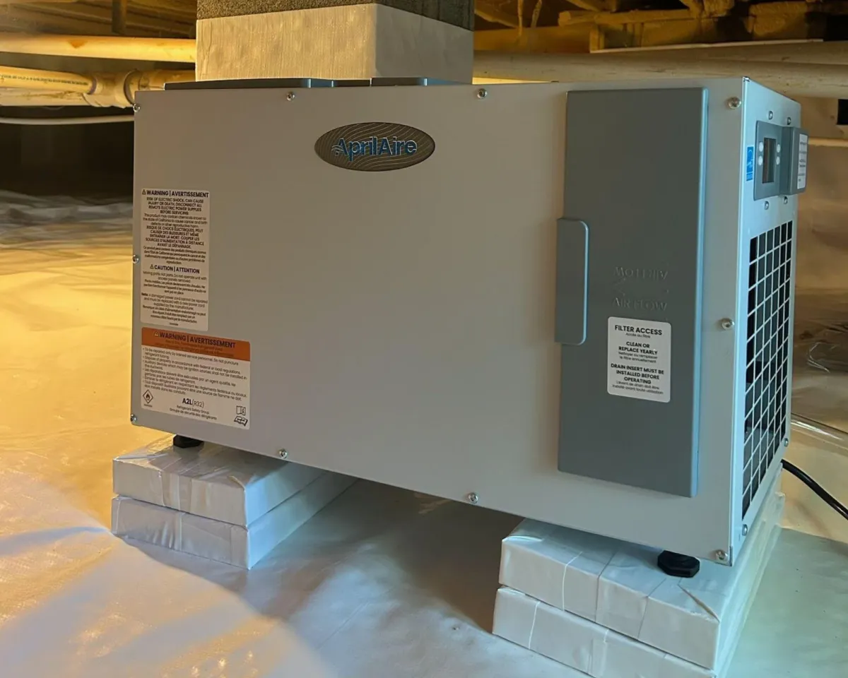 Dehumidifier installed in Arkansas home crawl space