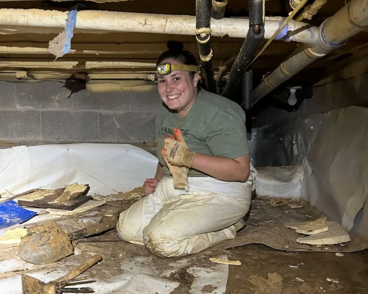 Crawl Space Fixers technician inspecting crawl space in Central Arkansas