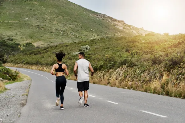 Image of a person engaging in physical activity, such as running, yoga, or dancing.