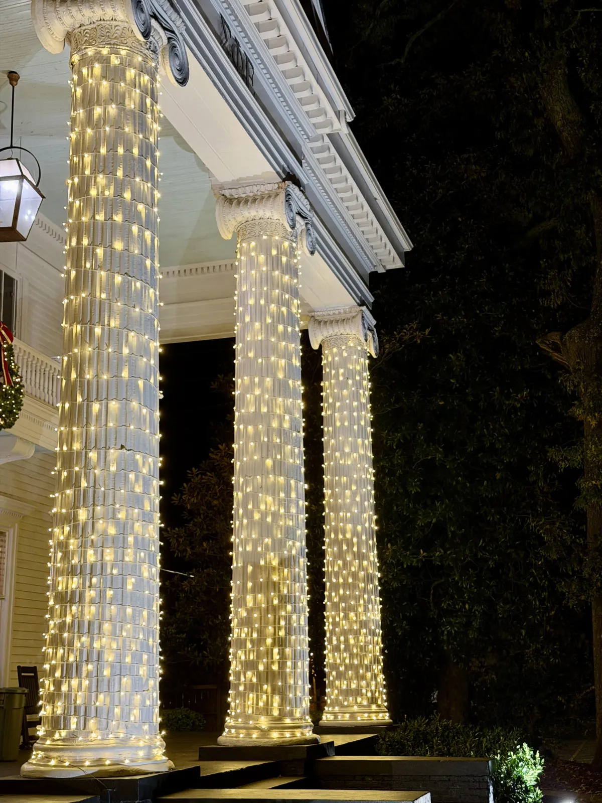 elegant warm white holiday lights on two story home in athens ga