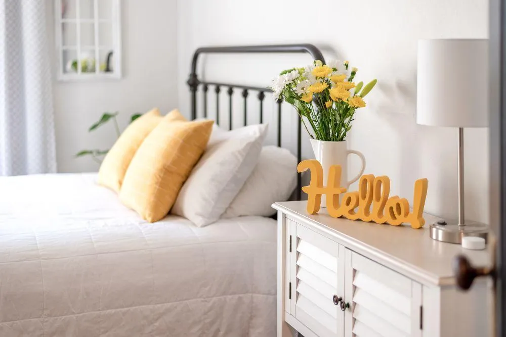 Refresh your guest bedroom with simple updates like new bedding, greenery, and layered lighting. Create a cozy, inviting space your guests will adore!