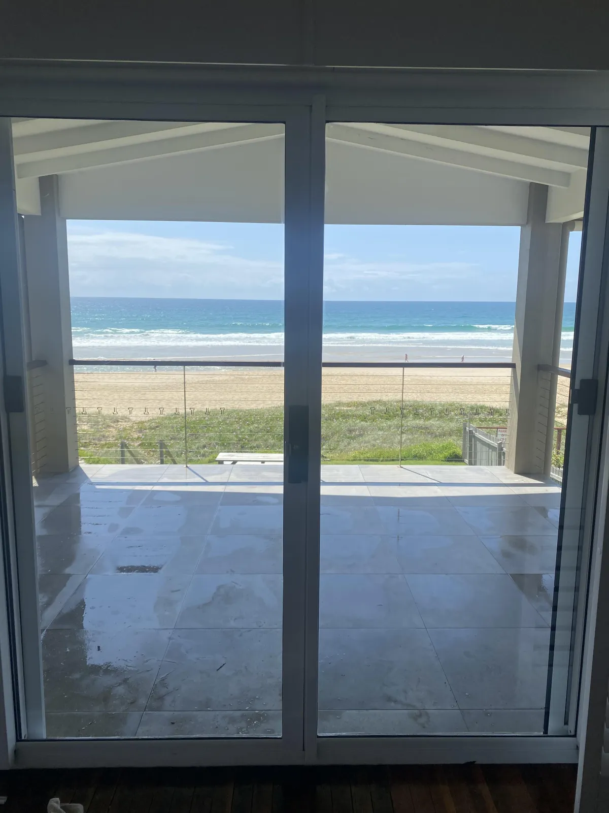 Absolute beachfront property in Mermaid Beach with crystal clear glass.