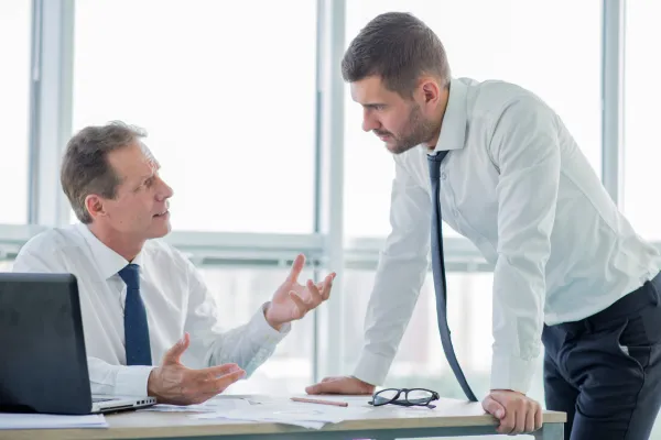 Two men talking to each other