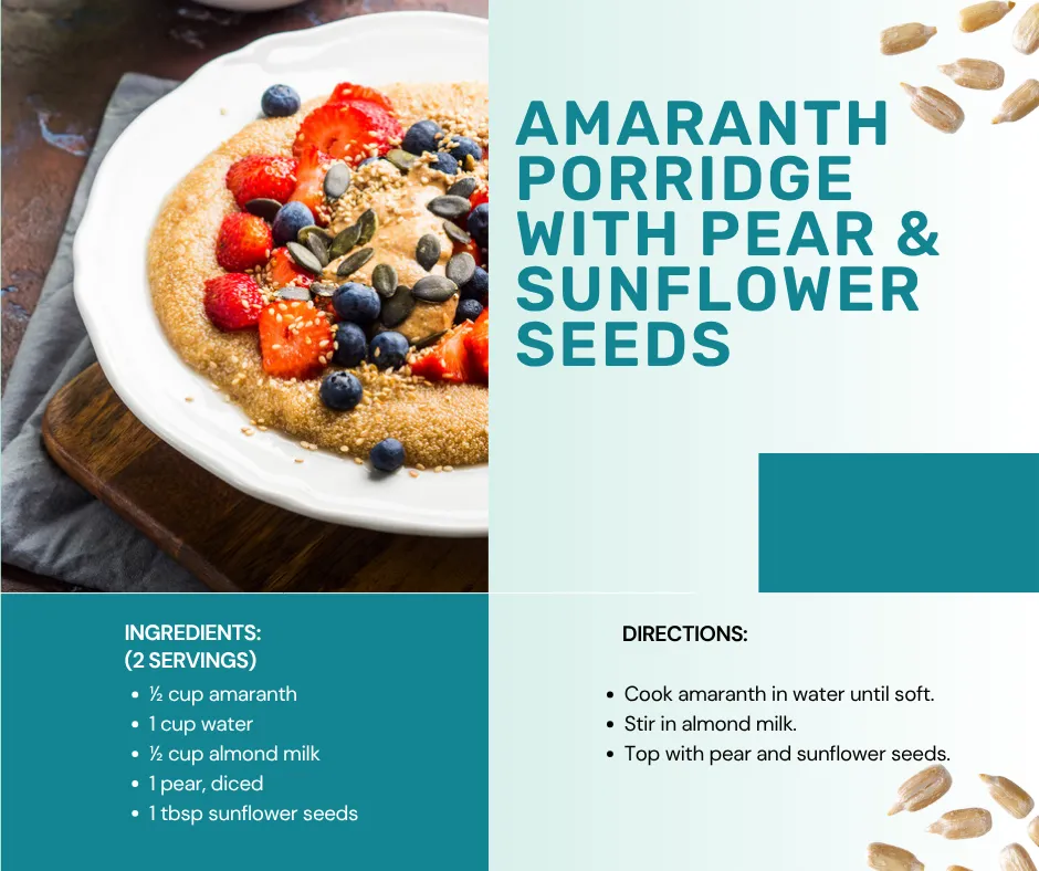 Amaranth porridge topped with fruits and seeds on a white plate.