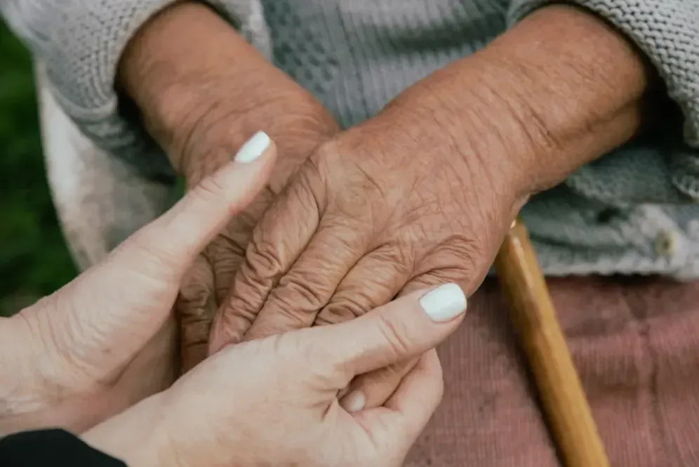 Compassionate in-home caregiver assisting senior in Encino