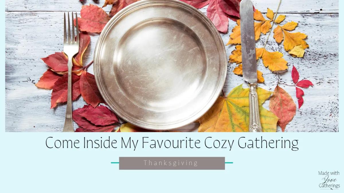 fall leaves on a barnboard table with a silver plate on top