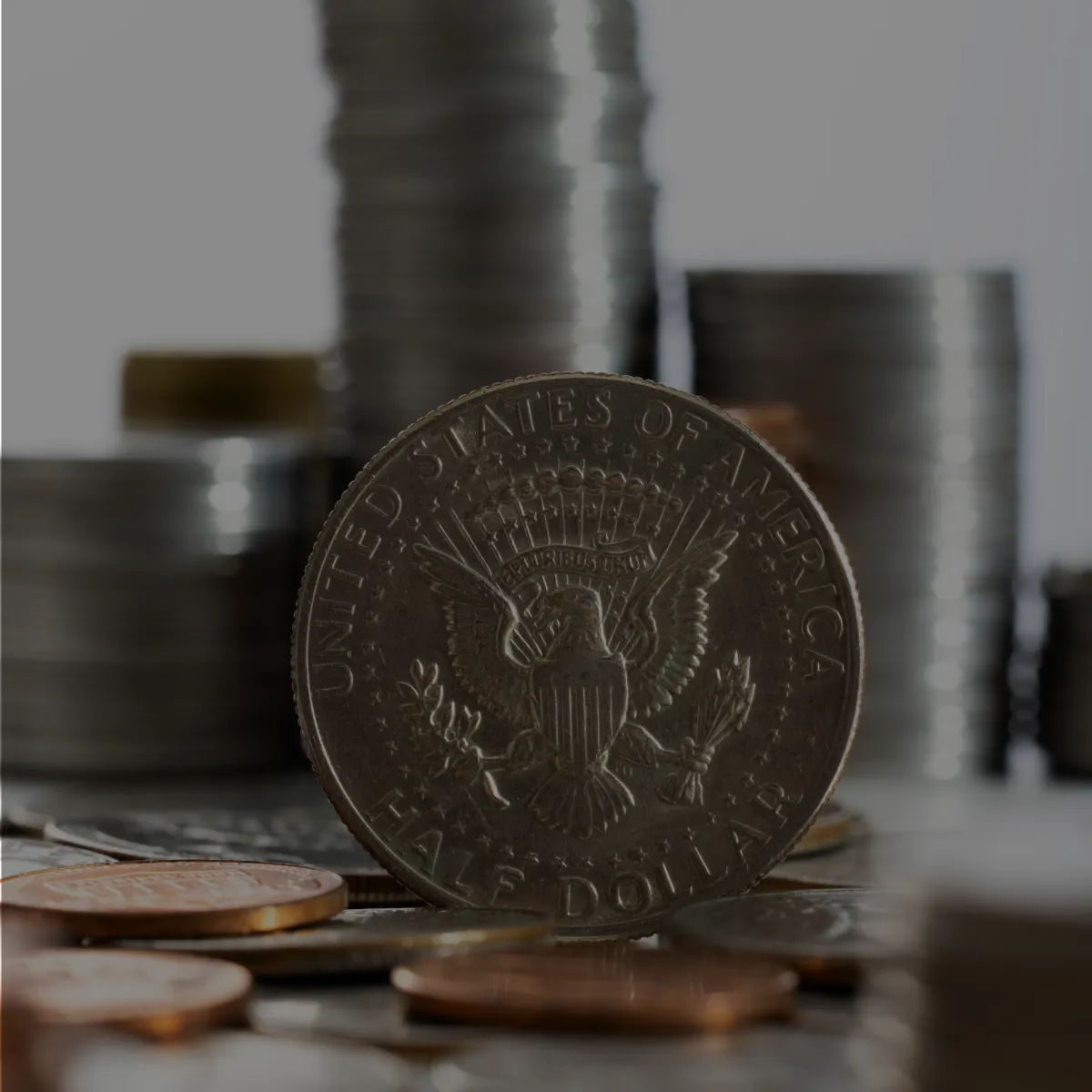 Close-up of a United States Silver Half Dollar coin showing the eagle crest.