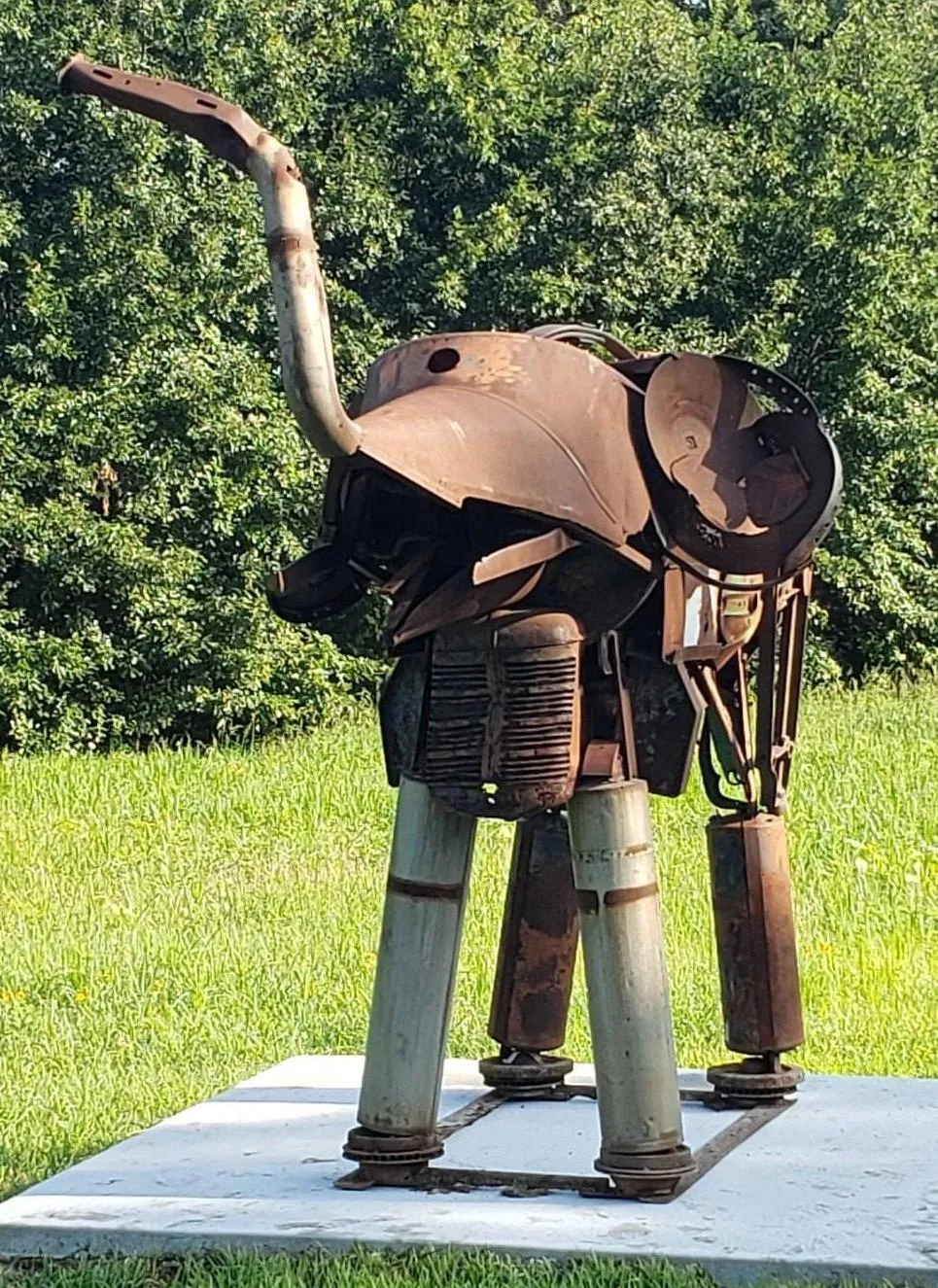 near life size elephant made from found objects welded together